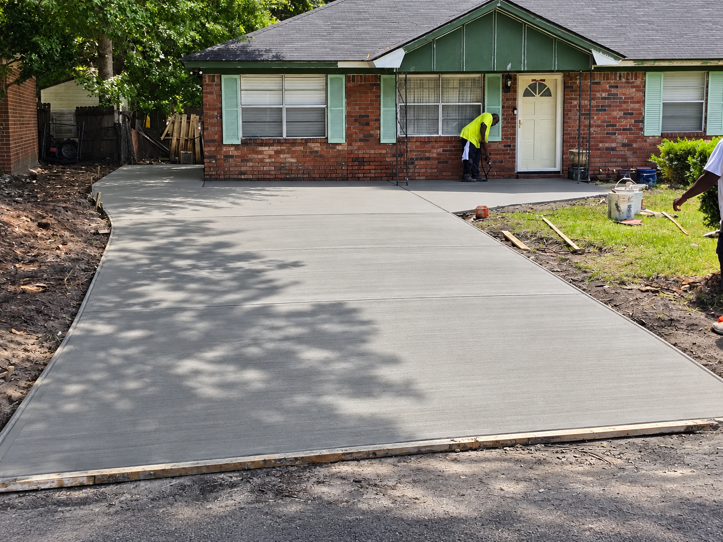 Fresh residential concrete driveway completed by Keyz2Savannah